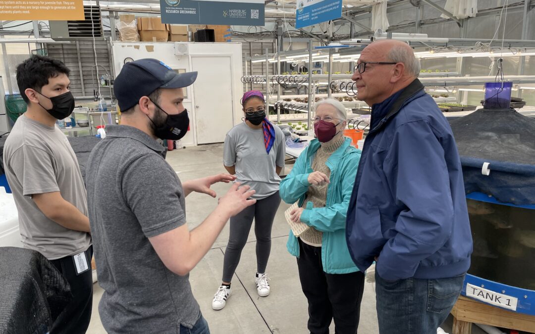 Lifelong learners with Pathways Institute learn about controlled environment agriculture with members of the Harrisburg University aquaponics team